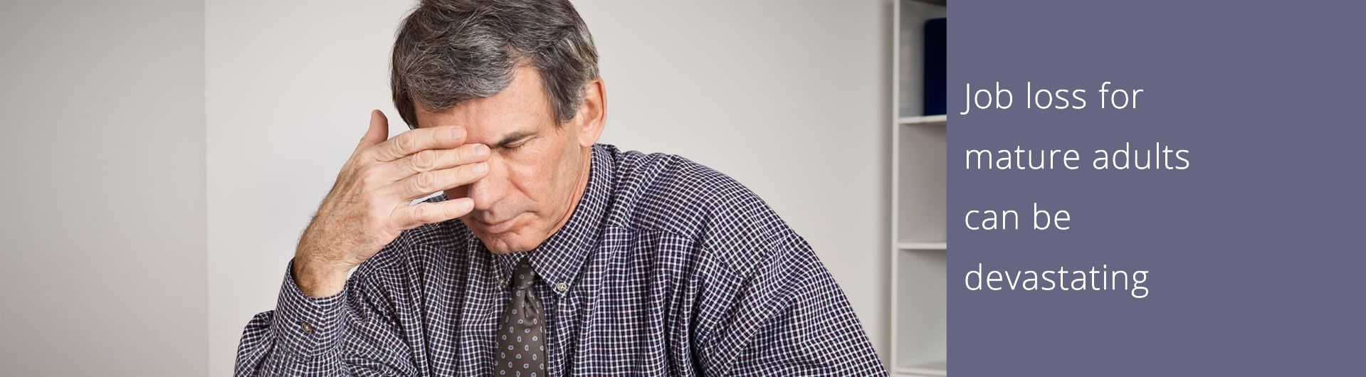 mature man grieving job loss